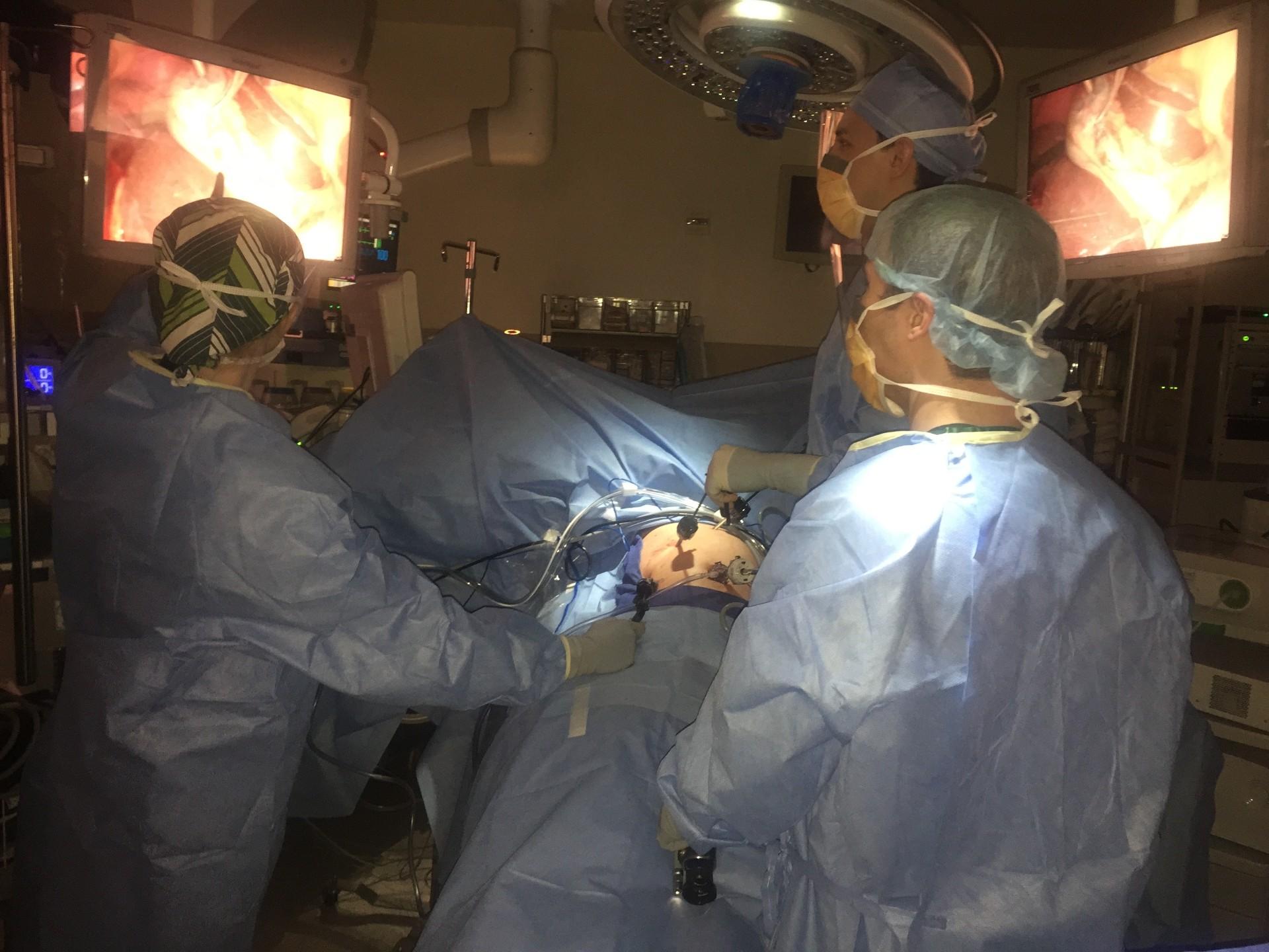 Dr. Rodriguez teaching residents in the operating room