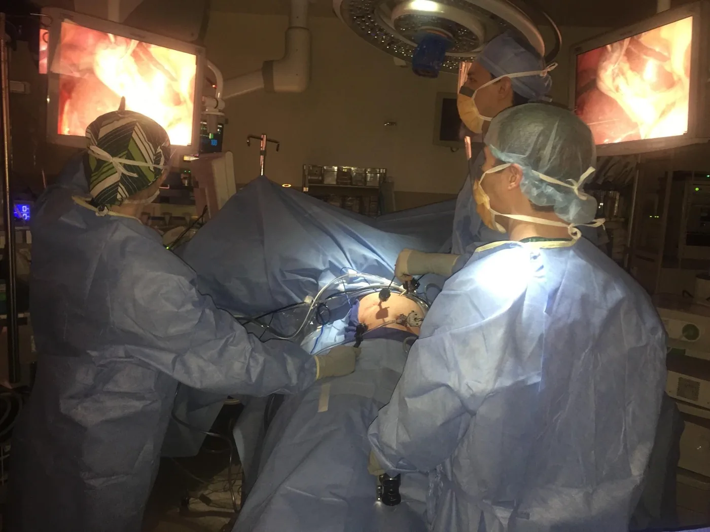 Dr. Rodriguez teaching residents in the operating room